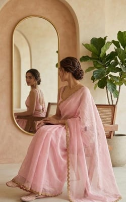 soft pastel pink with a subtle sheen and features the exact intricate gold beaded scalloped border