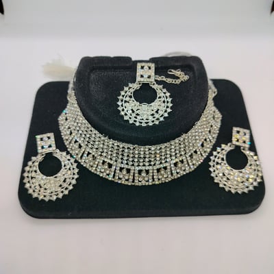 silver fancy choker  matching earring maang.