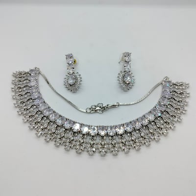 earrings are a matching cluster stud design