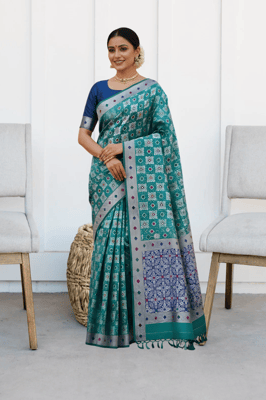 Buy ethnic teal blue silk-blend jacquard saree, possibly in a Kanjivaram or Banarasi style, 