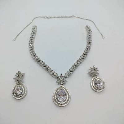 white finish necklace set, matching, earrings. 